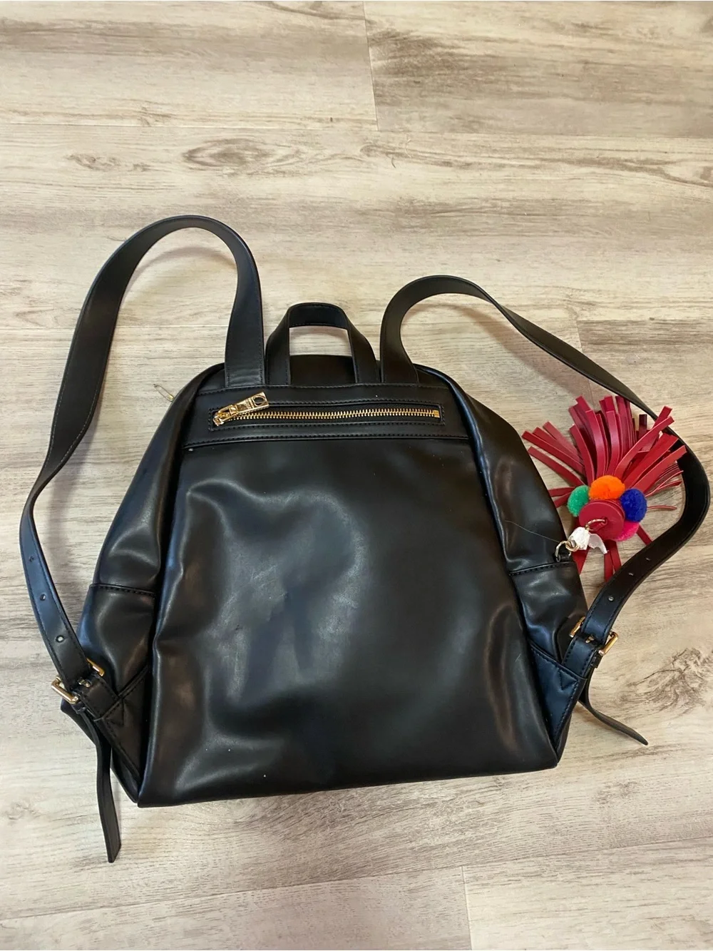 Love Moschino Black Backpack with Gold Logo and Red Tassel